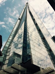 The shard in London with clouds reflecting on the glass